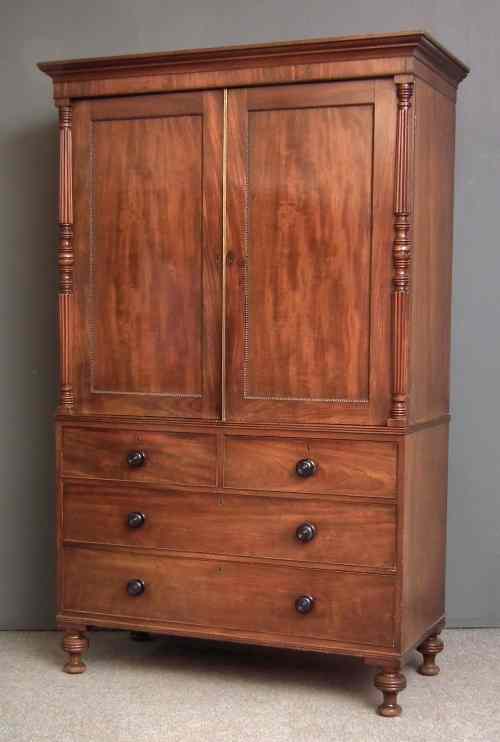 Appraisal: A George IV gentleman's figured mahogany wardrobe the upper part