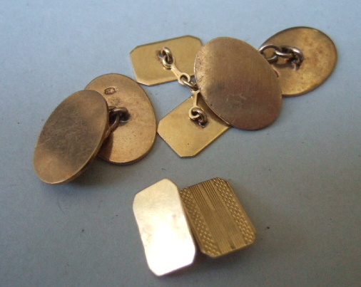 Appraisal: A pair of gold cufflinks of plain oval design and