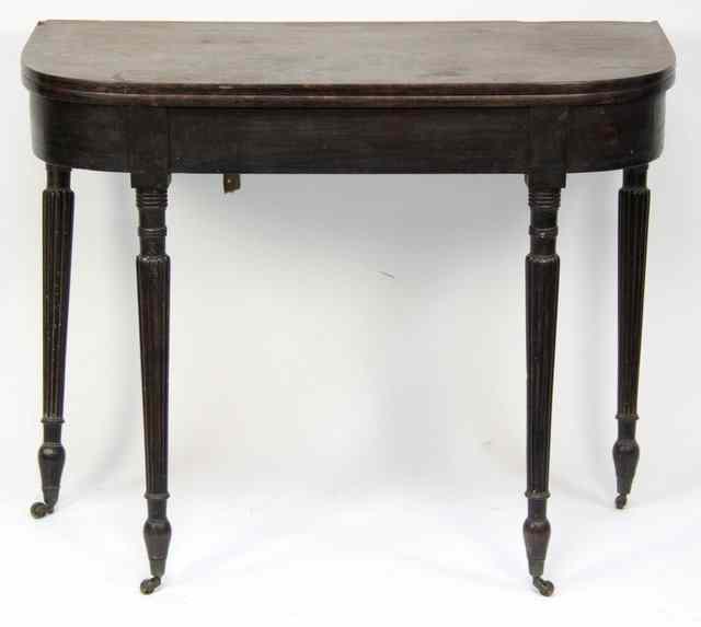 Appraisal: A Regency mahogany tea table the D-shaped fold-over top on