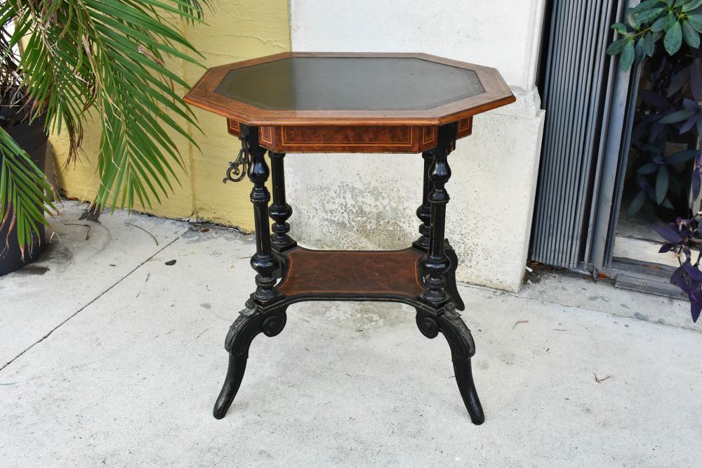 Appraisal: VICTORIAN INLAID WALNUT AND EBONIZED OCCASIONAL TABLECirca The octagonal leather-inset