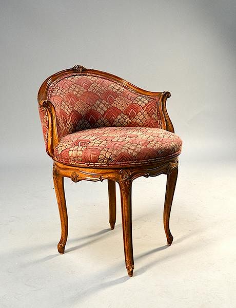 Appraisal: French Louis XVI style fruitwood swivel vanity chair French Louis