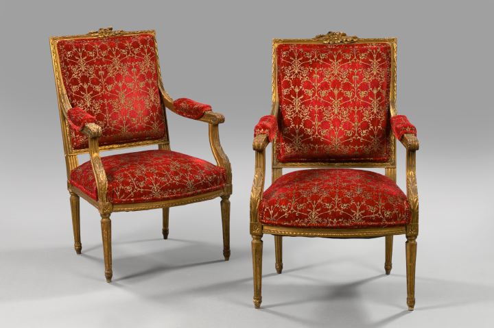 Appraisal: Pair of Louis XVI-Style Giltwood Fauteuils early th century each