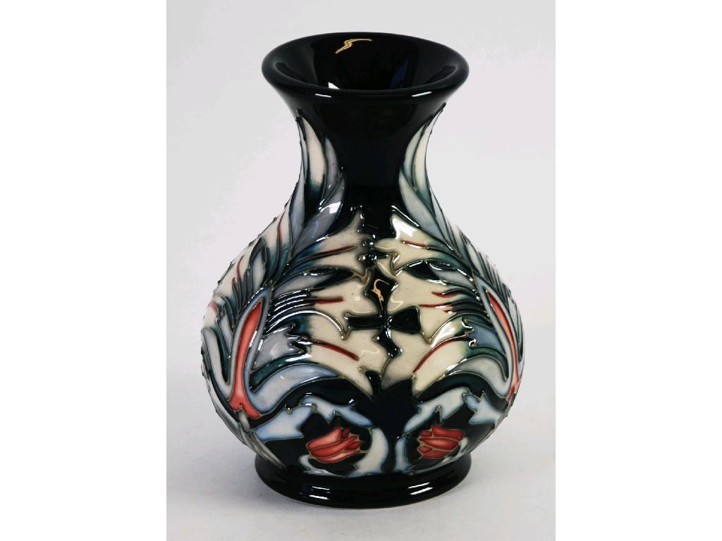 Appraisal: SECOND QUALITY MODERN MOORCROFT TUBE LINED POTTERY VASE of compressed