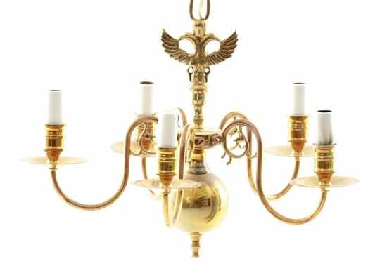 Appraisal: Continental brass five-light chandelier eagle atop shaped stem issuing scrolling