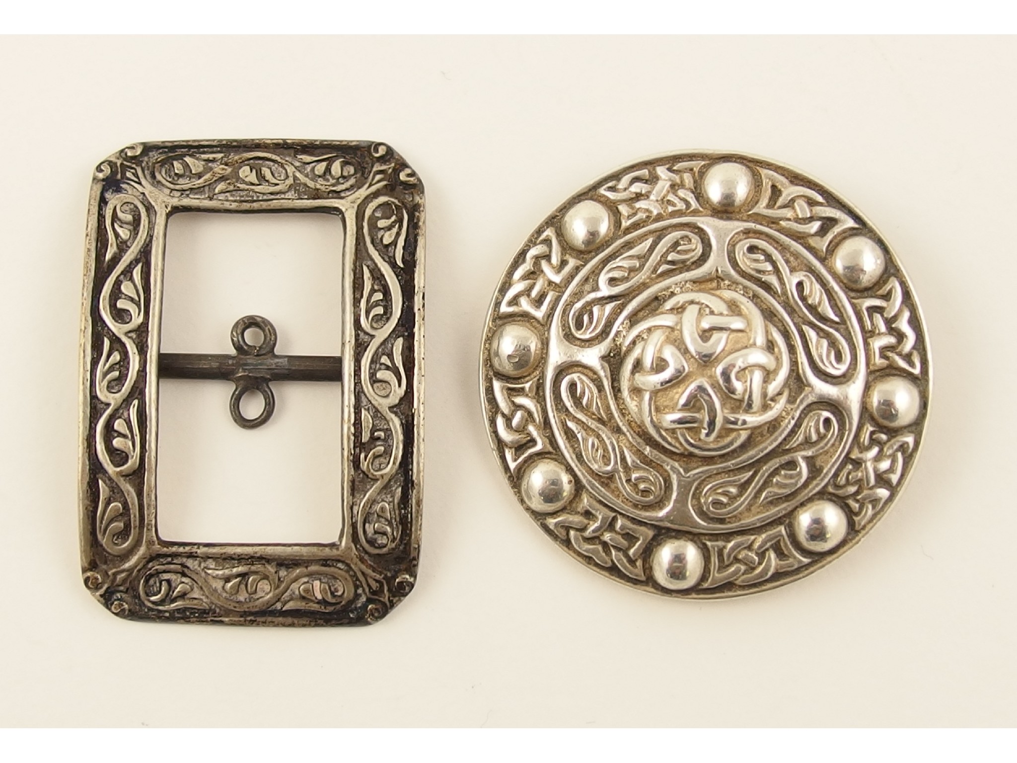 Appraisal: An Alexander Ritchie shield brooch together with an Alexander Ritchie