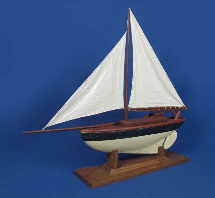 Appraisal: LARGE WOOD POND BOAT ON STAND Mid th century hand