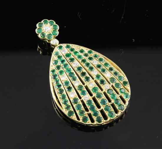 Appraisal: A late 's ct gold emerald and diamond encrusted teardrop