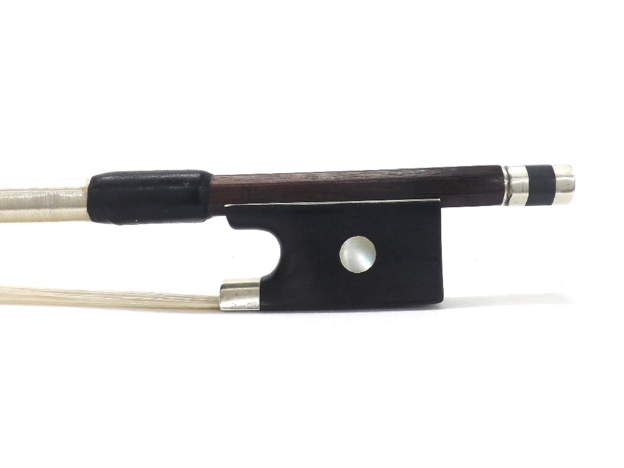 Appraisal: Silver mounted violin bow unstamped the stick octagonal the ebony