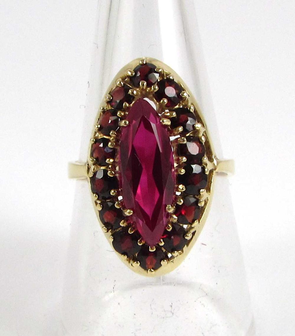 Appraisal: RED GARNET AND SYNTHETIC RED RUBY CLUSTER RING Marquise-cut synthetic