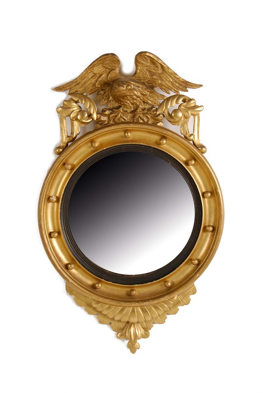 Appraisal: A Regency style gilt convex mirror