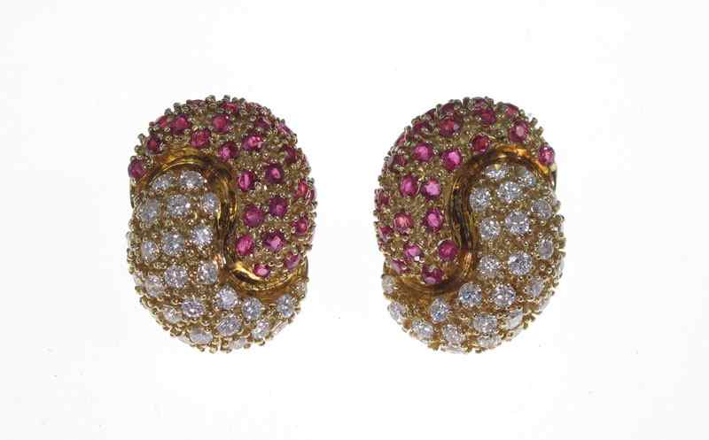 Appraisal: K DIAMOND RUBY EARRINGS K yellow gold earrings contain fifty