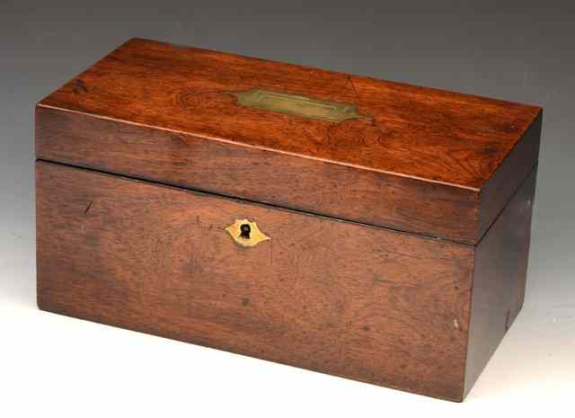 Appraisal: A GEORGIAN MAHOGANY TEA CADDY with fitted interior wide together