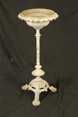 Appraisal: A Victorian white painted cast iron stem jardiniere in cm