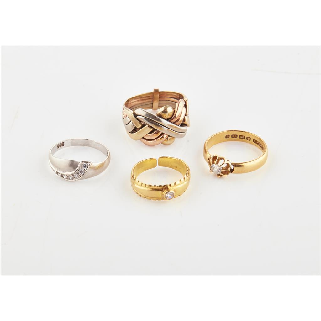 Appraisal: A gentleman's ct three colour gold puzzle ring the yellow