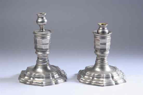 Appraisal: PAIR CONTINENTAL PEWTER CANDLESTICKS Serpentine shaped bases octagonal standards -