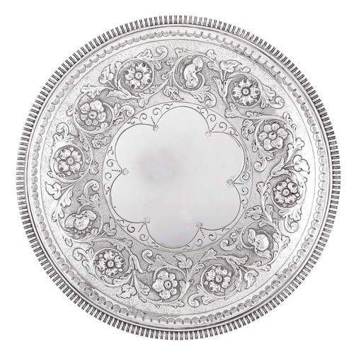 Appraisal: A Victorian silver fruit dish with floral chased border and