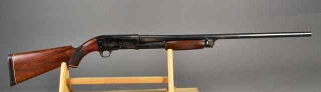 Appraisal: Ithaca Gauge Pump ShotgunSerial number an early model shotgun with