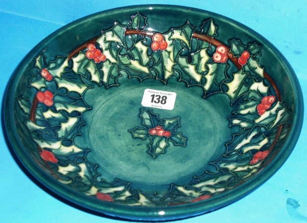 Appraisal: Moorcroft footed dish decorated with Holly Leaves design Diameter cm