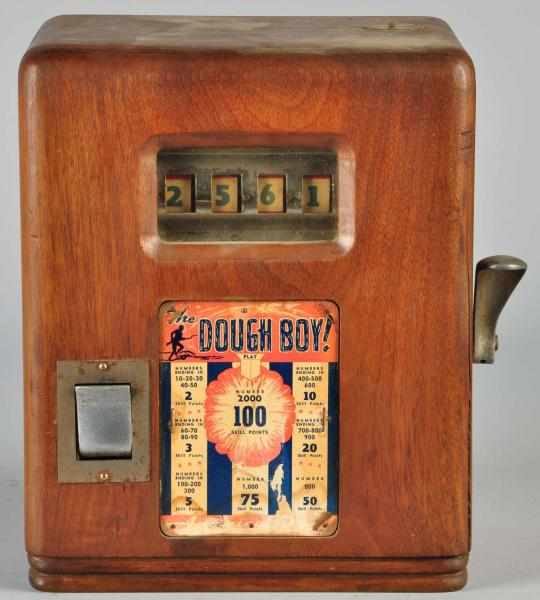 Appraisal: The Doughboy Trade Stimulator Description Working Wooden case Includes gum