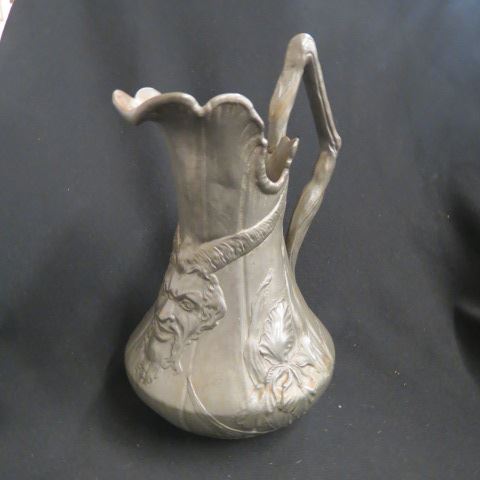 Appraisal: Kayserzinn Art Nouveau Pewter Pitcher devil's head floral th century