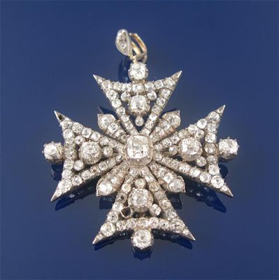 Appraisal: A Victorian diamond set Maltese cross brooch pendant set over