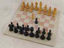 Appraisal: A Staunton type boxwood chess set in mahogany box together