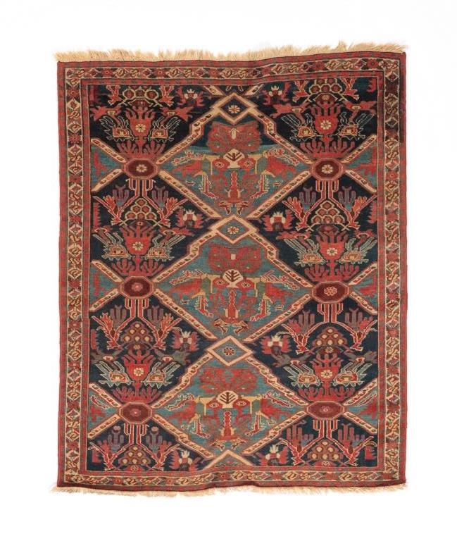 Appraisal: PERSIAN AFSHAR RUG Ca Archaic dragon and phoenix design with