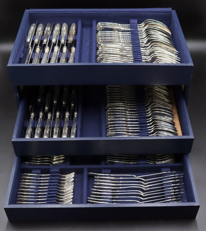 Appraisal: SILVER BELGIAN DELHEID FRERES FLATWARE SET A spectacular cased monogrammed