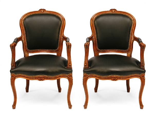 Appraisal: A set of four Louis XV carved walnut fauteuils height