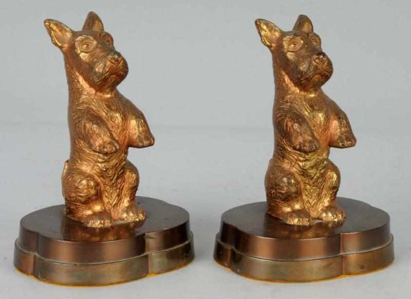 Appraisal: Pair of Begging Scottie Bookends Description Spelter Begging Scotties on