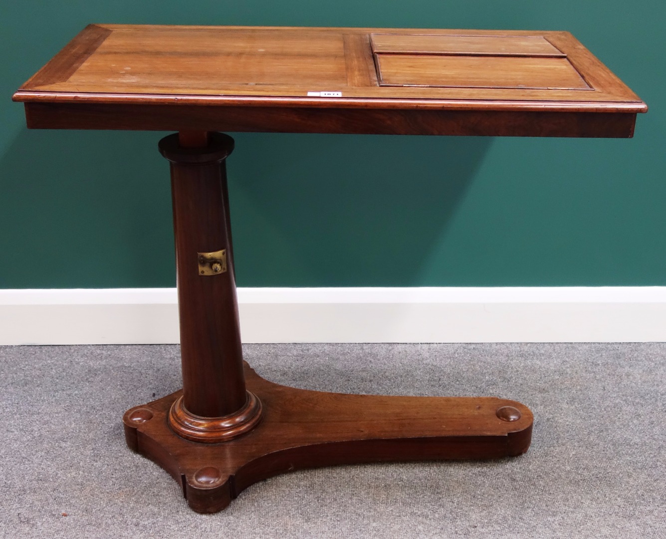 Appraisal: A Victorian rosewood bed reading table with double angle reading