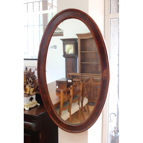 Appraisal: Large antique oval wooden framed mirror approx cm x cm