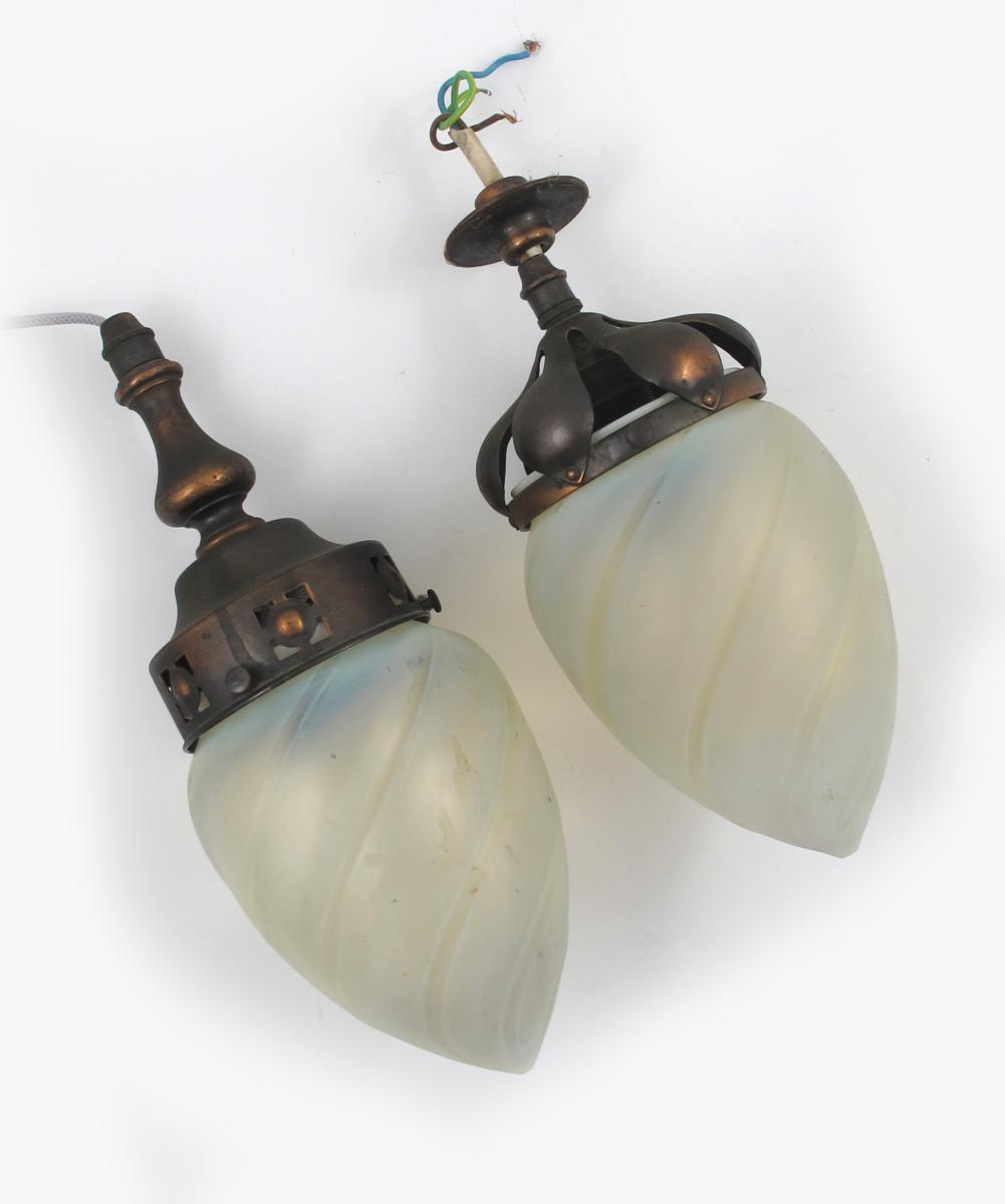 Appraisal: Two vaseline glass shades with patinated copper fittings