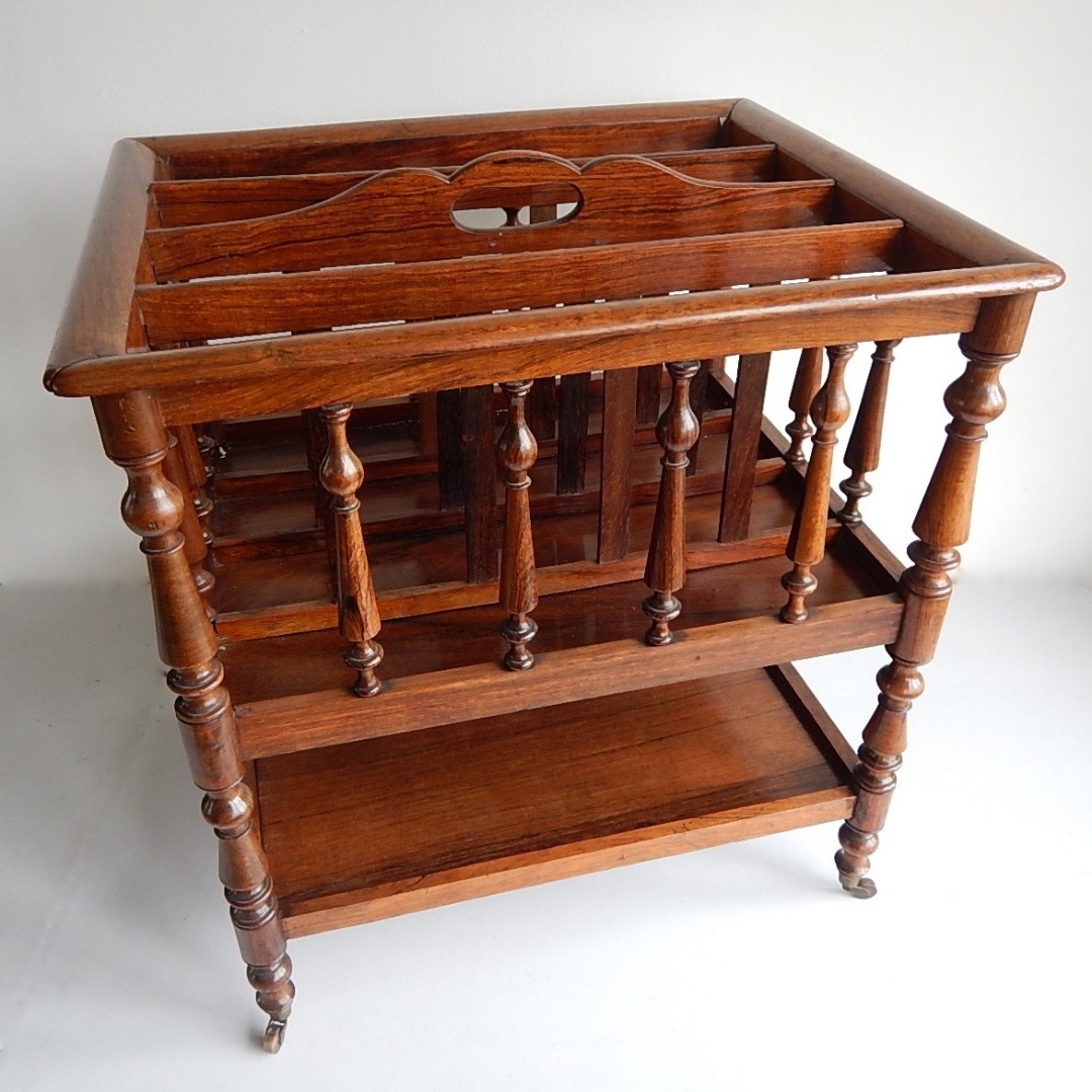 Appraisal: A Regency rosewood Canterbury with four divisions and open platform