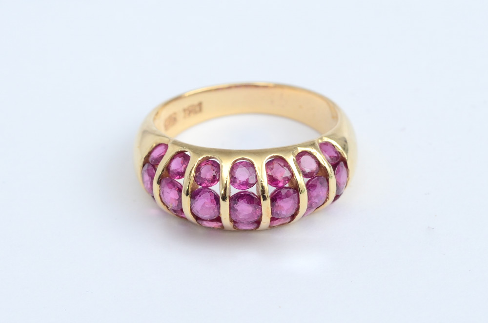 Appraisal: RUBY RING K yellow gold ring contains round rubies totaling