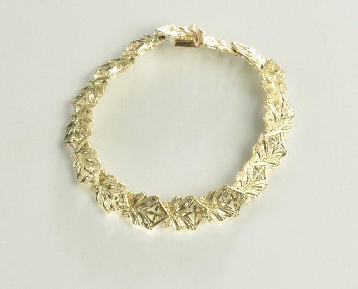 Appraisal: FOURTEEN KARAT YELLOW GOLD BRACELET measuring inches in length and