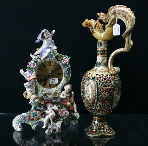 Appraisal: Three th century German porcelain clocks including one by Sitzendorf