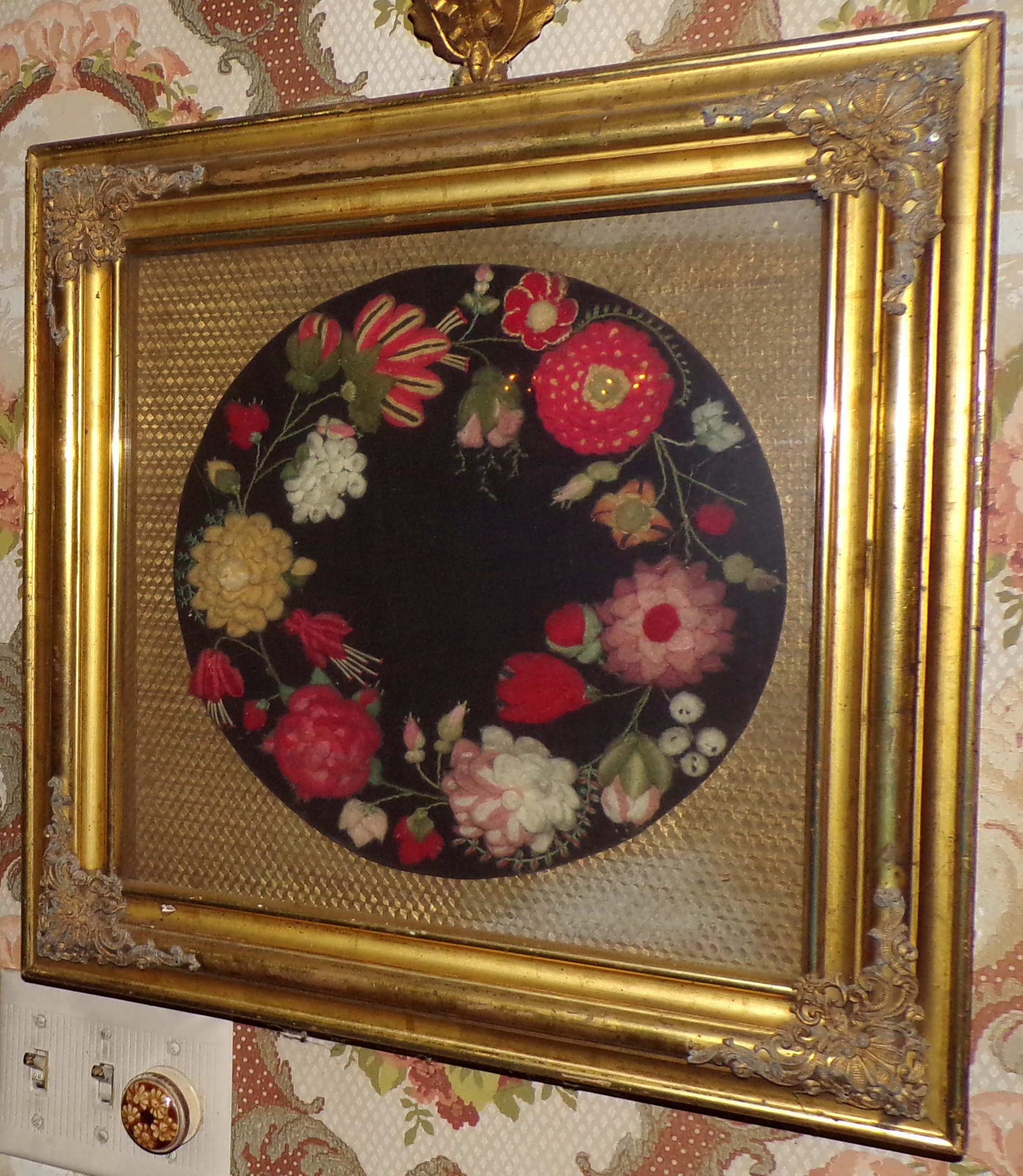 Appraisal: Victorian wreath textile wreath set on black background encased in