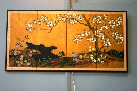 Appraisal: A mounted Japanese seven folding screen with four panels depicting