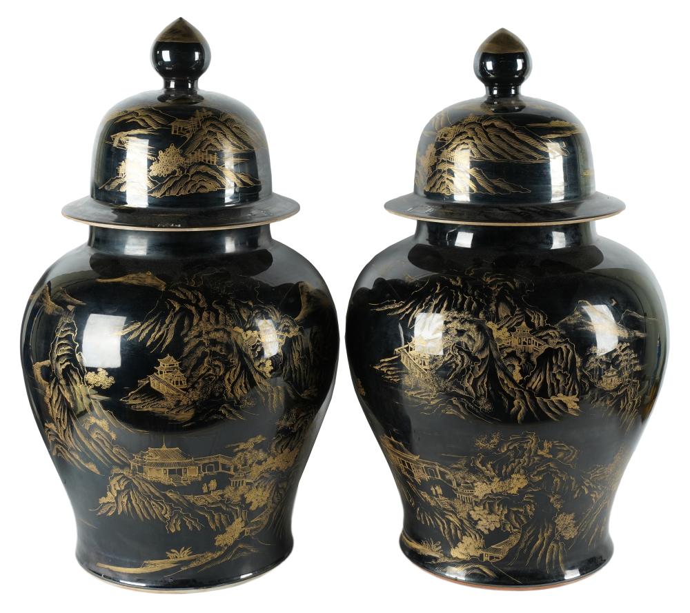 Appraisal: PAIR OF BLACK GOLD PORCELAIN COVERED TEMPLE JARSunsigned not drilled