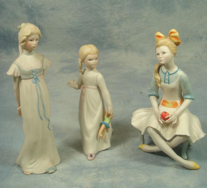 Appraisal: Cybis porcelain figurines Girl with Doll Girl with Apple Girl