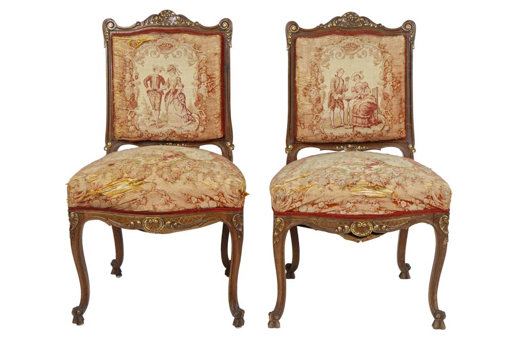 Appraisal: PAIR OF TAPESTRY-COVERED SIDE CHAIRSthe carved frames with traces of