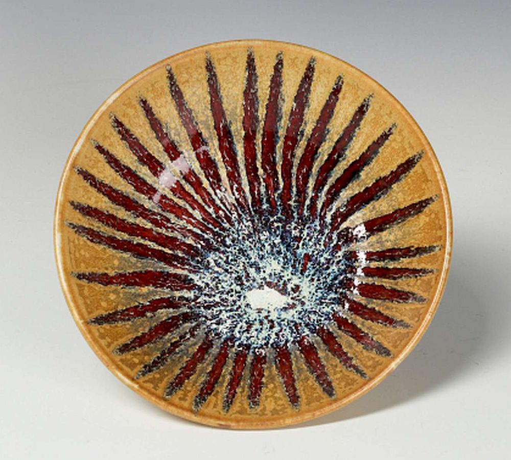 Appraisal: A HARDING BLACK STUDIO POTTERY SUNBURST BOWL With brownish tan