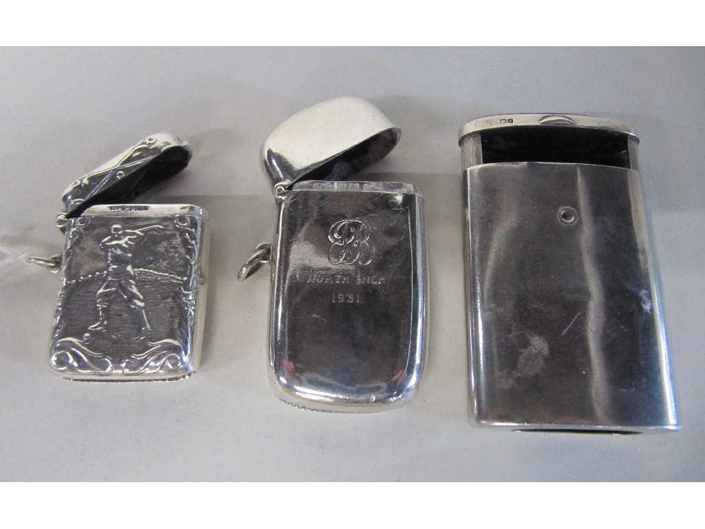 Appraisal: Lot comprising three silver vestas one with golfing motif assorted