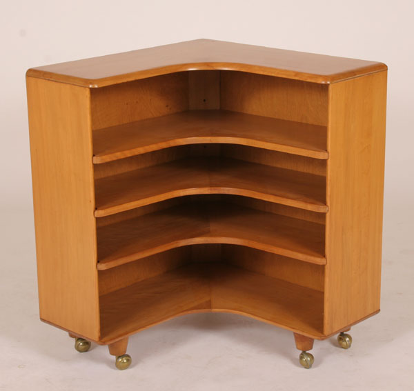 Appraisal: Heywood Wakefield rolling corner bookcase book shelf with three adjustable