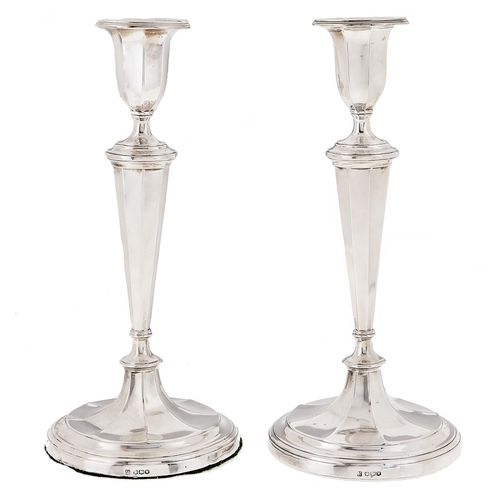 Appraisal: A pair of George VI silver candlesticks in neo classical