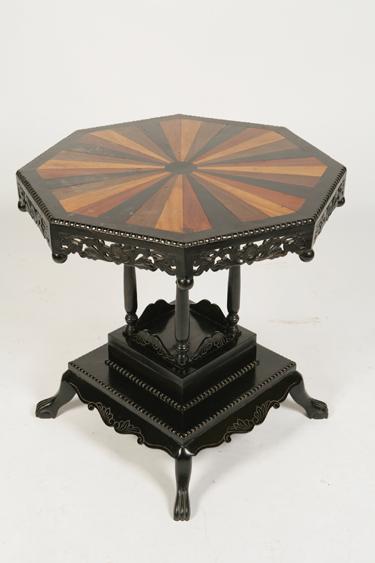 Appraisal: A CEYLONESE EBONY AND SPECIMEN WOOD OCCASIONAL TABLE the octagonal