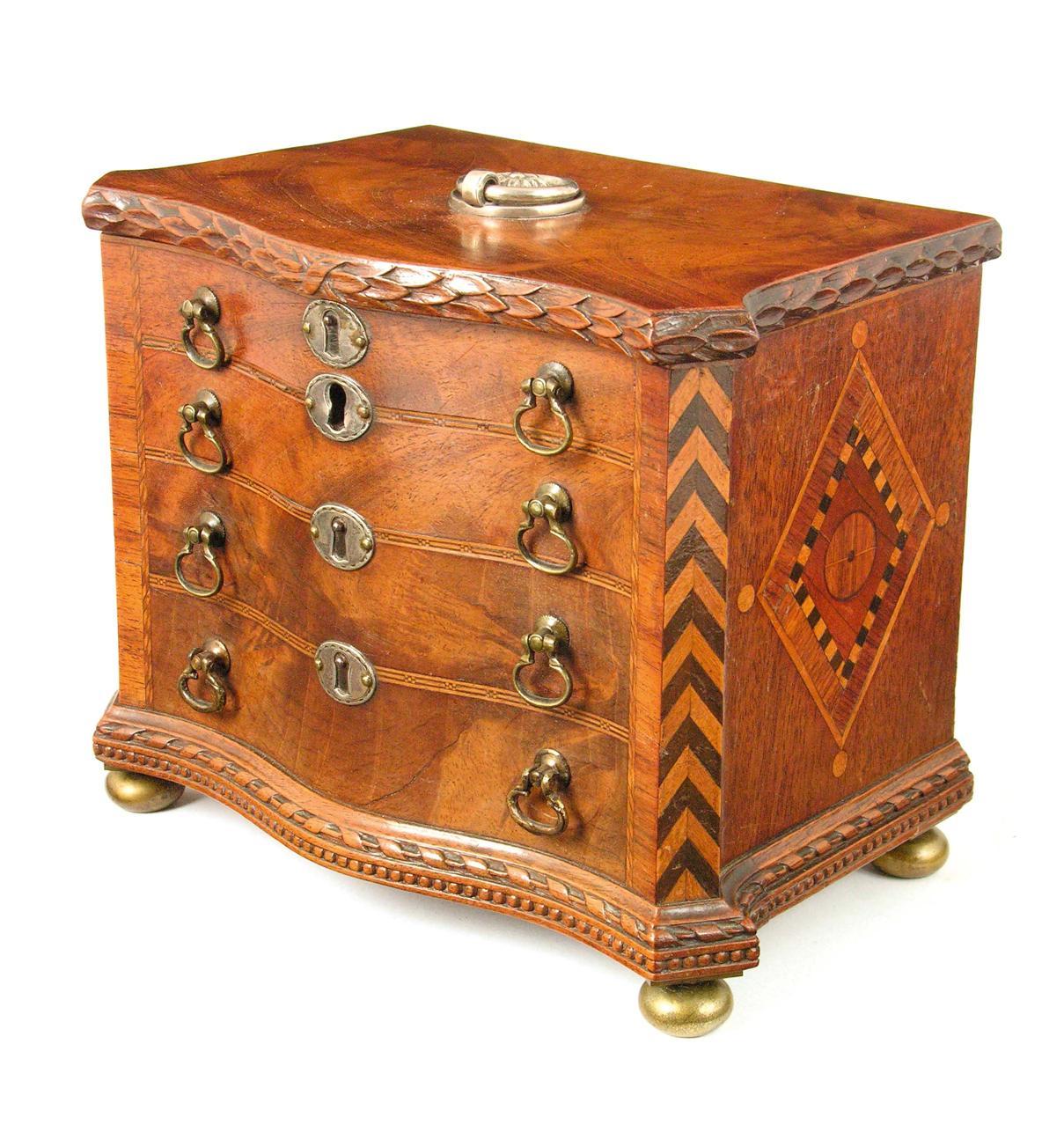 Appraisal: A th century Scottish mahogany serpentine front tea chest