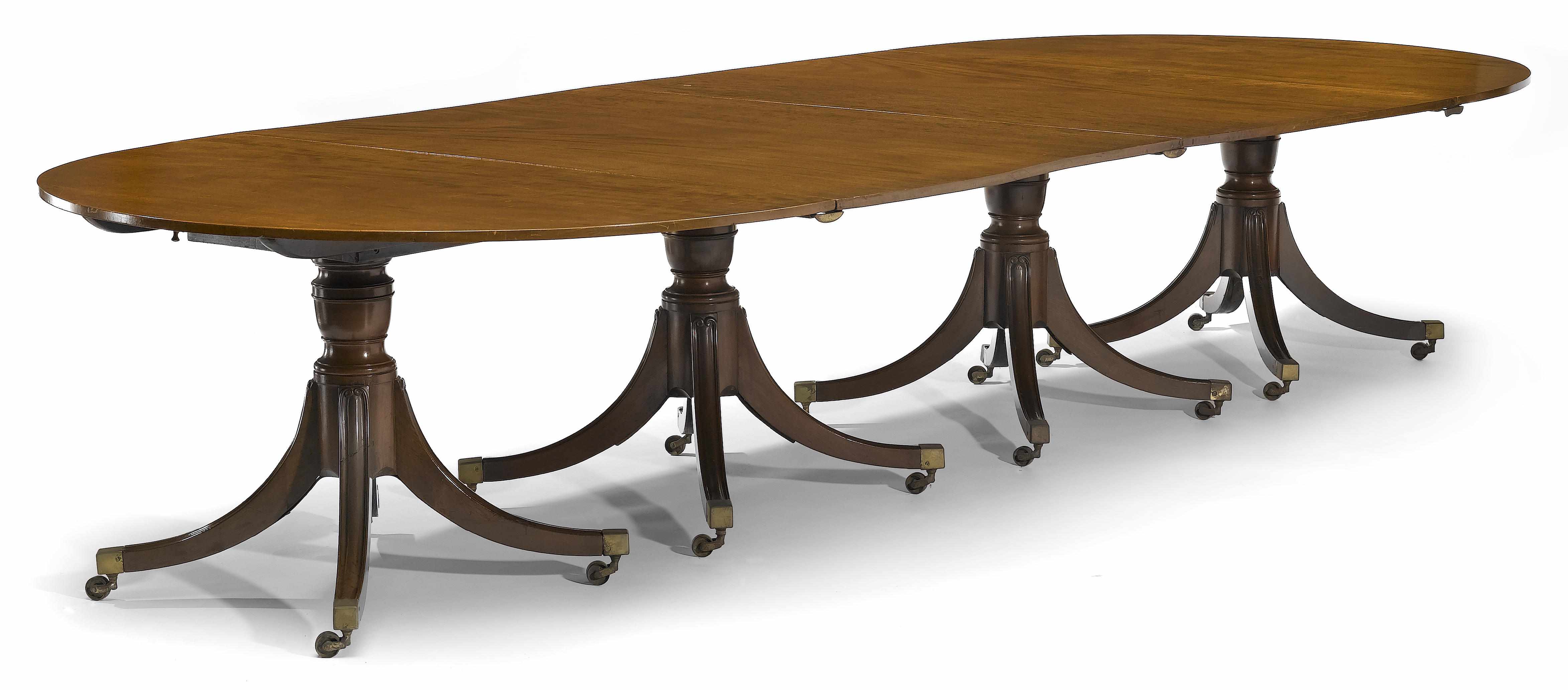 Appraisal: A George III mahogany four pillar banquet table circa The