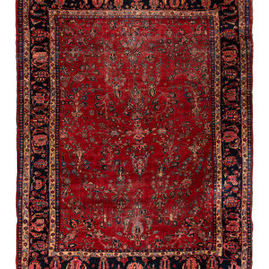 Appraisal: A Sarouk Wool Rug Mid- th Century feet inches x